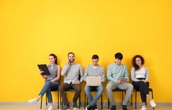 Young people waiting for job interview indoors
