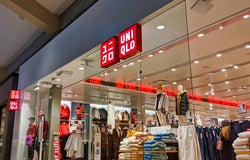 Bellevue, WA / USA - November 1st, 2019: Uniqlo clothing store in a mall, with lots of different fall and winter clothing on display and on sale.